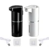 Automatic Foaming Soap Dispenser - Black and White Variants Black and white automatic touchless foaming soap dispensers with USB-C cables and wall mount brackets on a white background